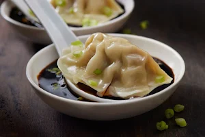 Momos Munchies - Logo