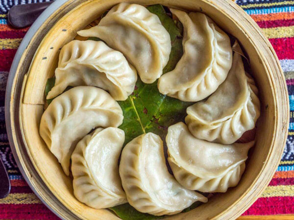 momos unlimited - Logo
