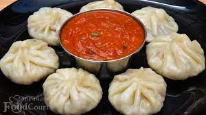 Momos World - Logo