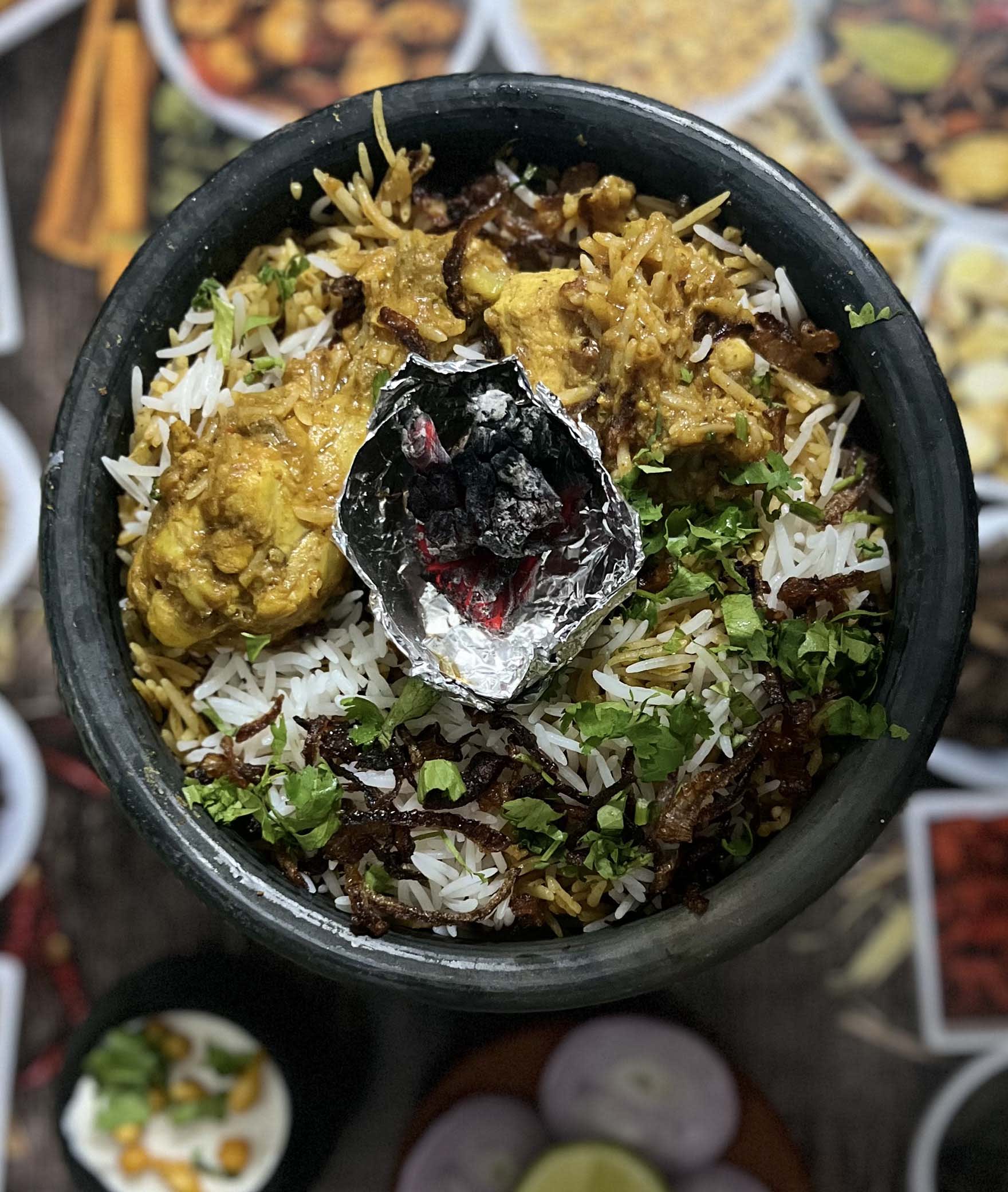 Mom's Biryani - Logo