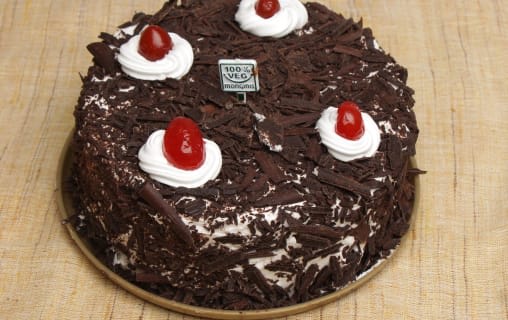 Monginis Cake Shop - Logo