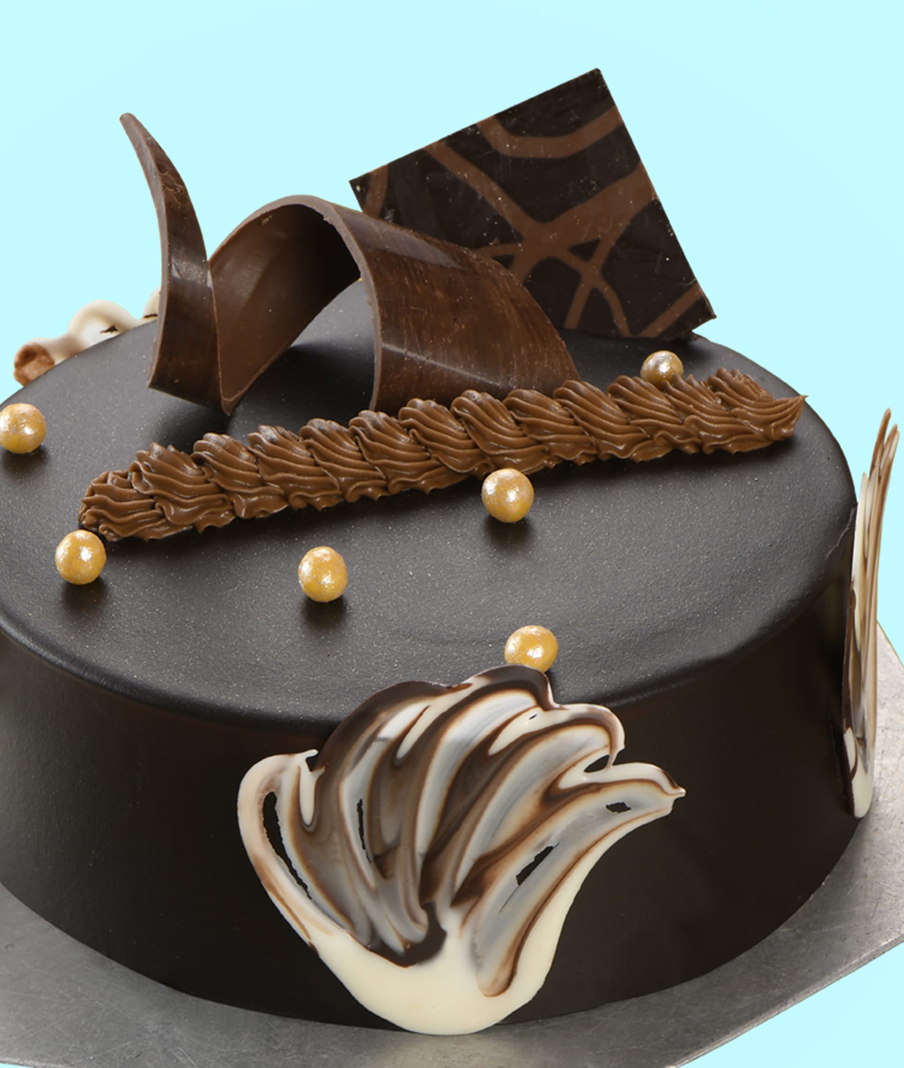 Monginis Cake Shop - Logo