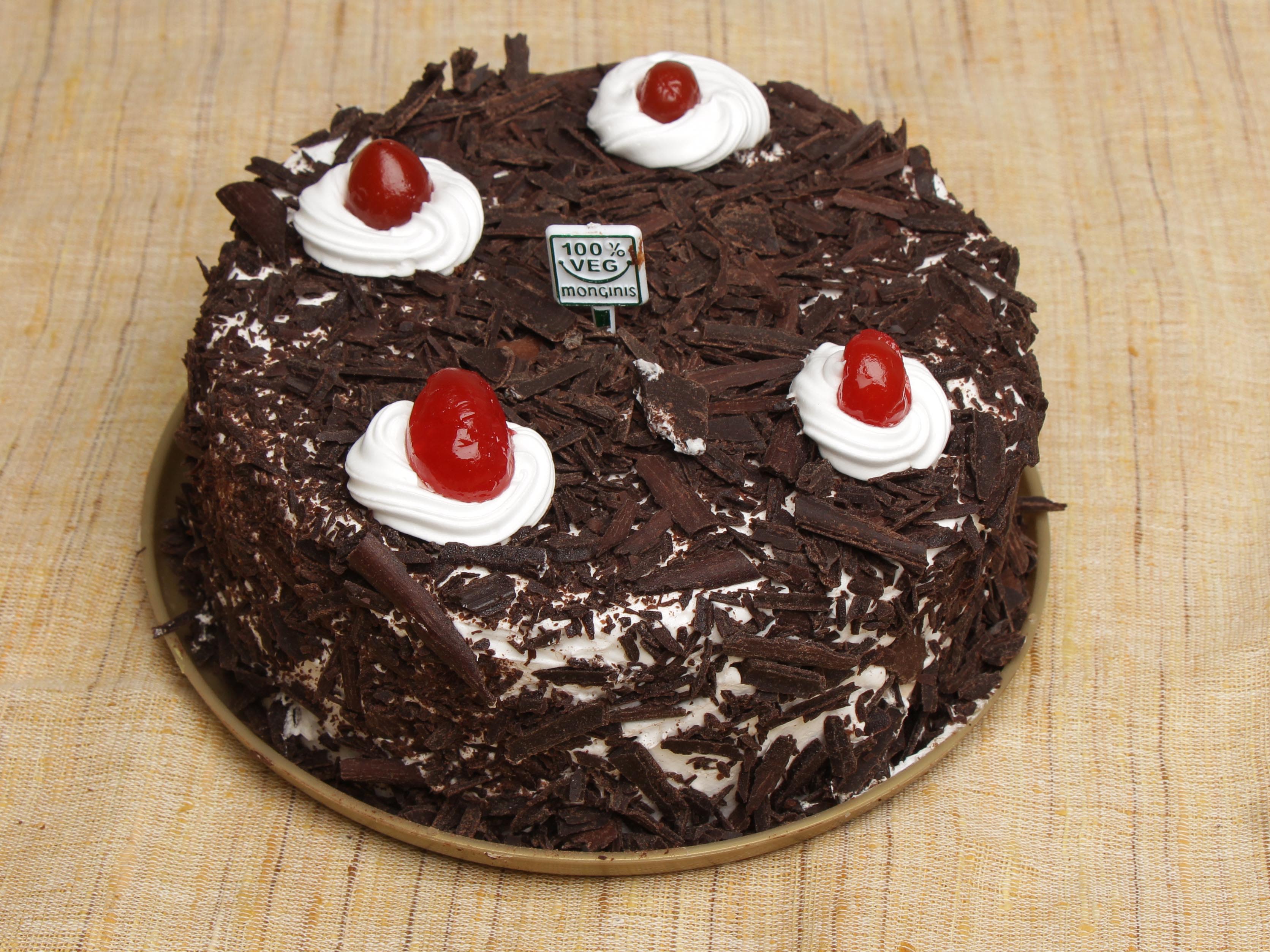 Monginis Cake Shop - Logo