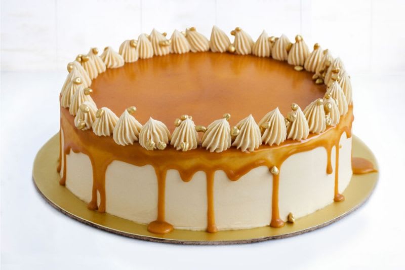 Monginis Cake Shop - Logo