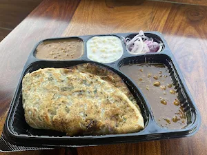 Moolchand Chur Chur Naan & Paratha Since 1979 - Logo