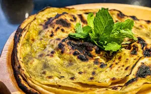 Moolchand Chur Chur Naan & Paratha Since 1979 - Logo
