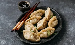 Mother's momo - Logo