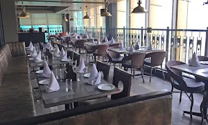 Moti Mahal Delux Legendary Culinary - Logo