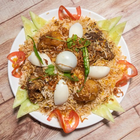 Mrityunjoy Restaurant - Logo