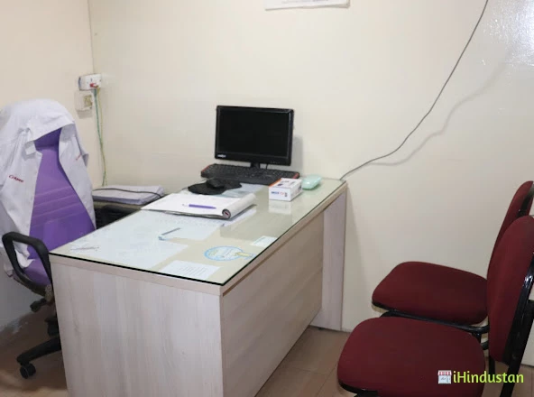 Mukherjee Dental Clinic - Logo