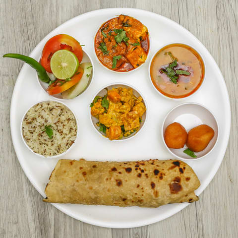 MUKUT DHAR Shrinath Restaurant - Logo