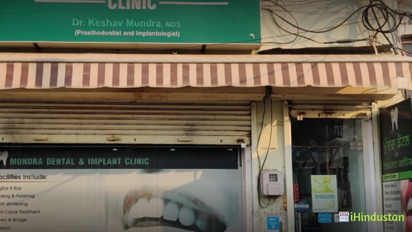 Mundra Dental Clinic - Logo