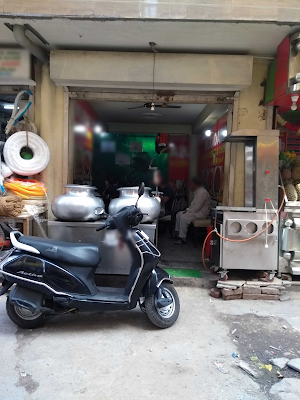 Muradabadi Hyderabadi Biryani & Chicken Corner - Logo