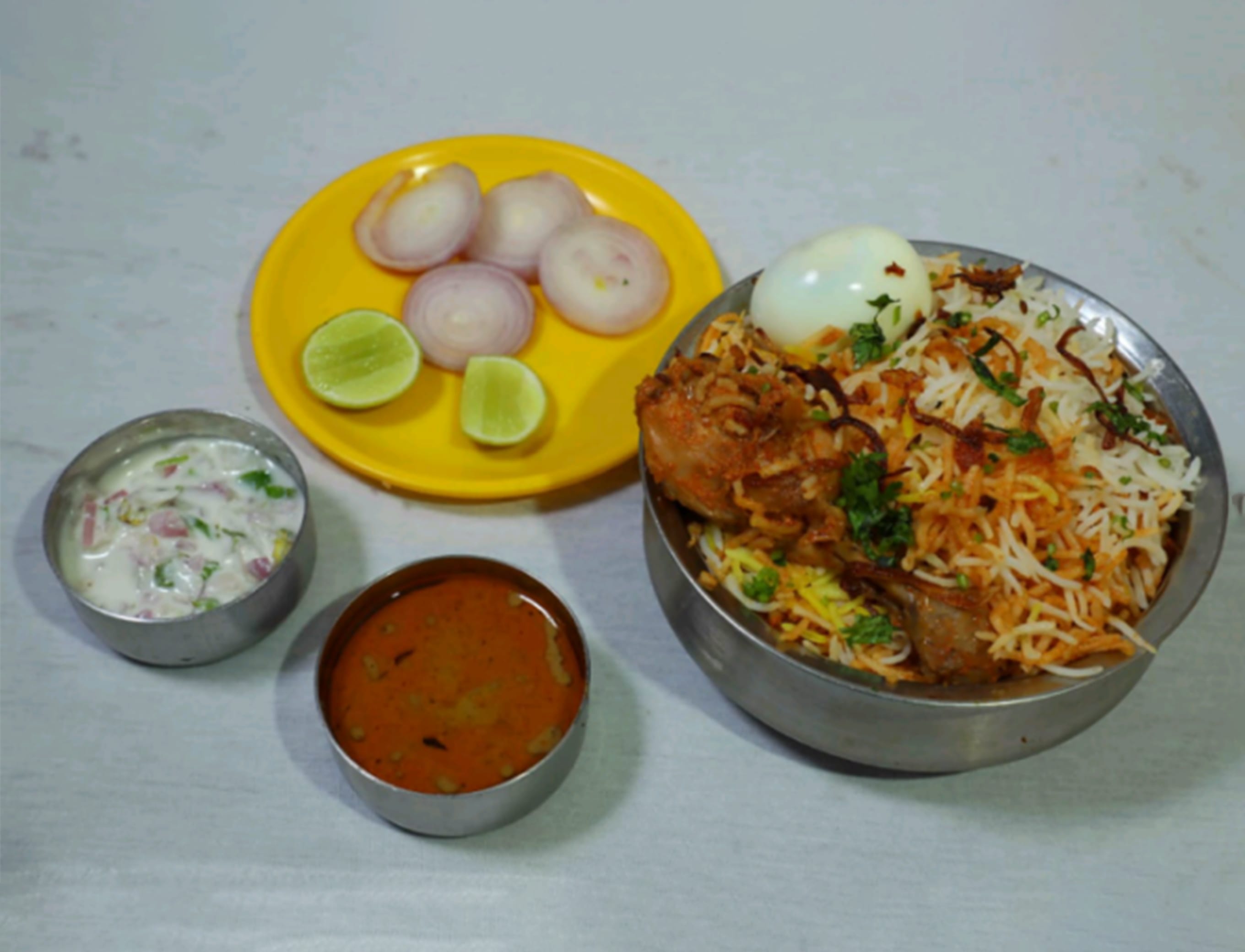 Muradabadi Hyderabadi Biryani & Chicken Corner - Logo
