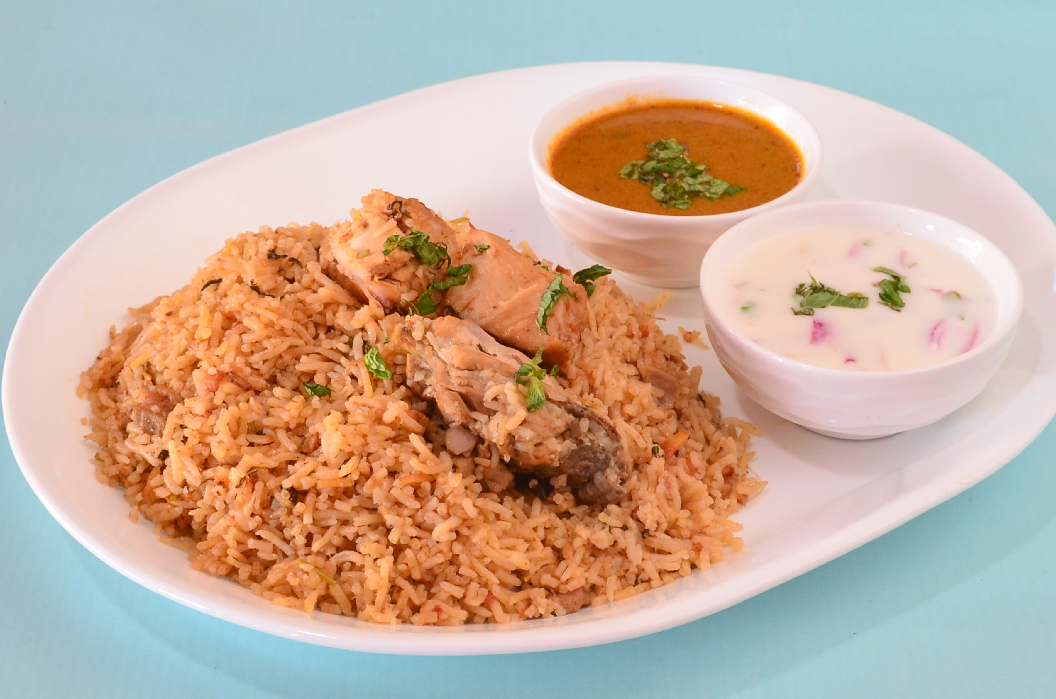 Mustafa Hyderabad dum biryani - Logo