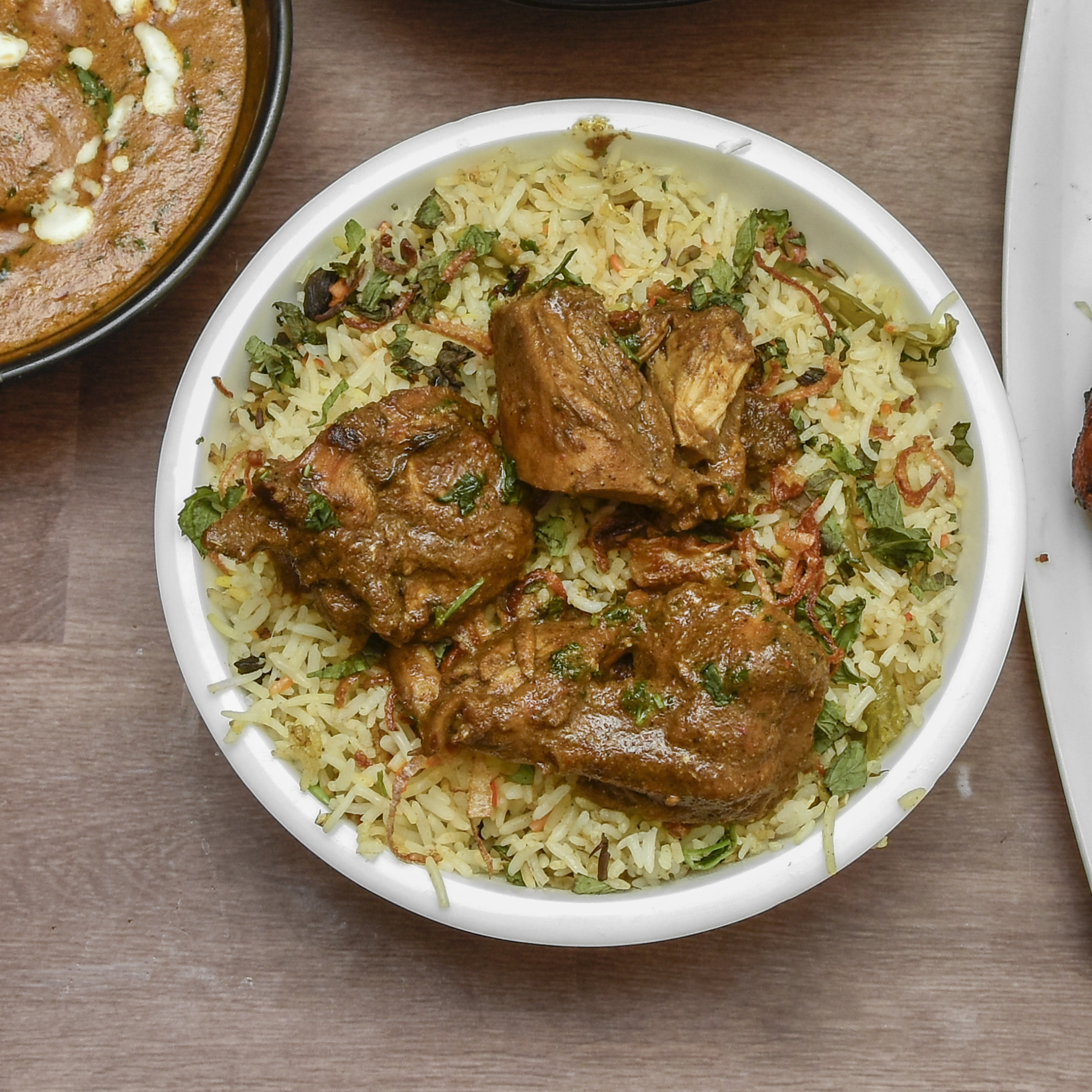 Musthar Briyani - Logo