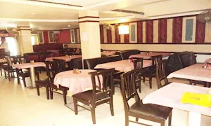 Mythri Bar & Restaurant - Logo