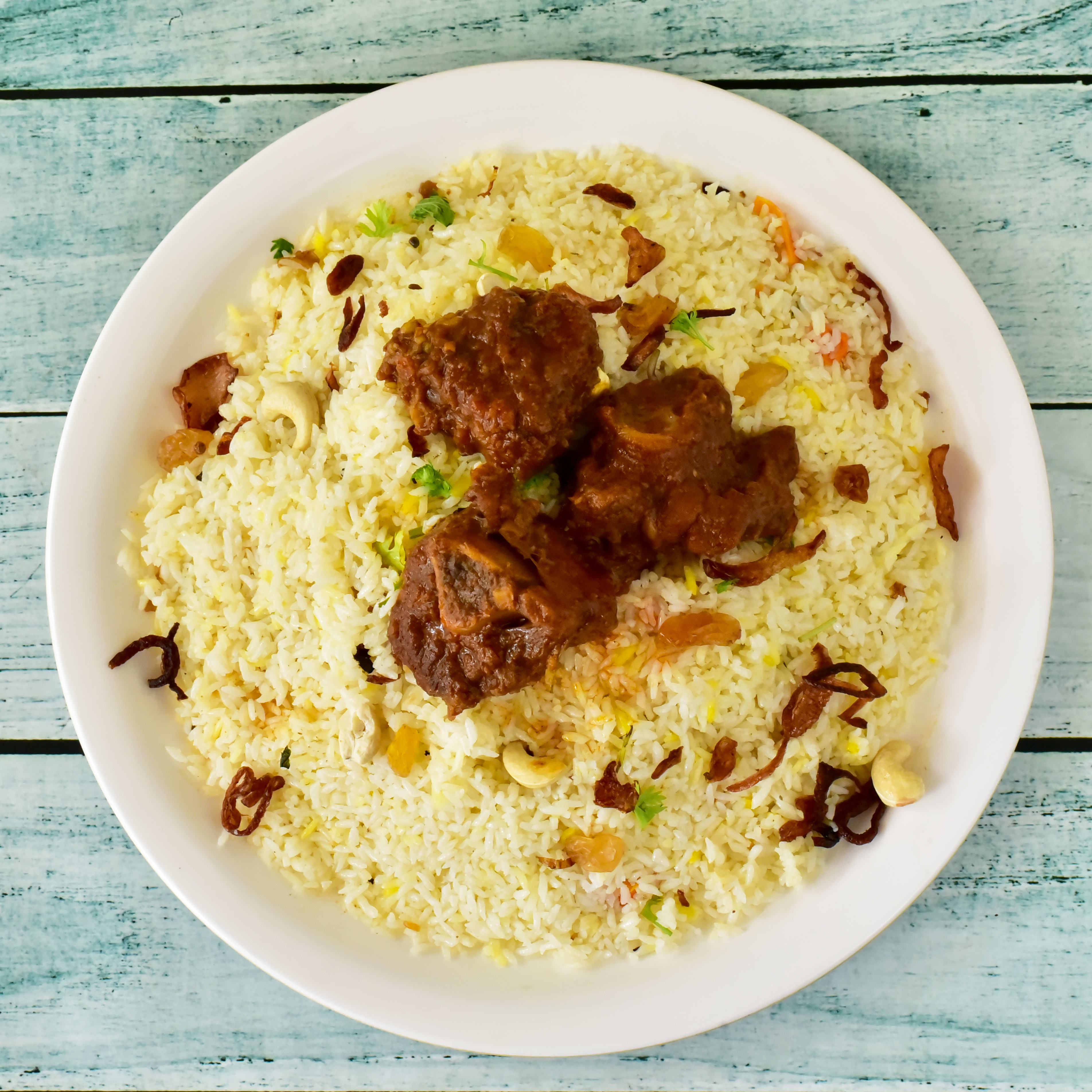 Mythri Biriyani Hut - Logo