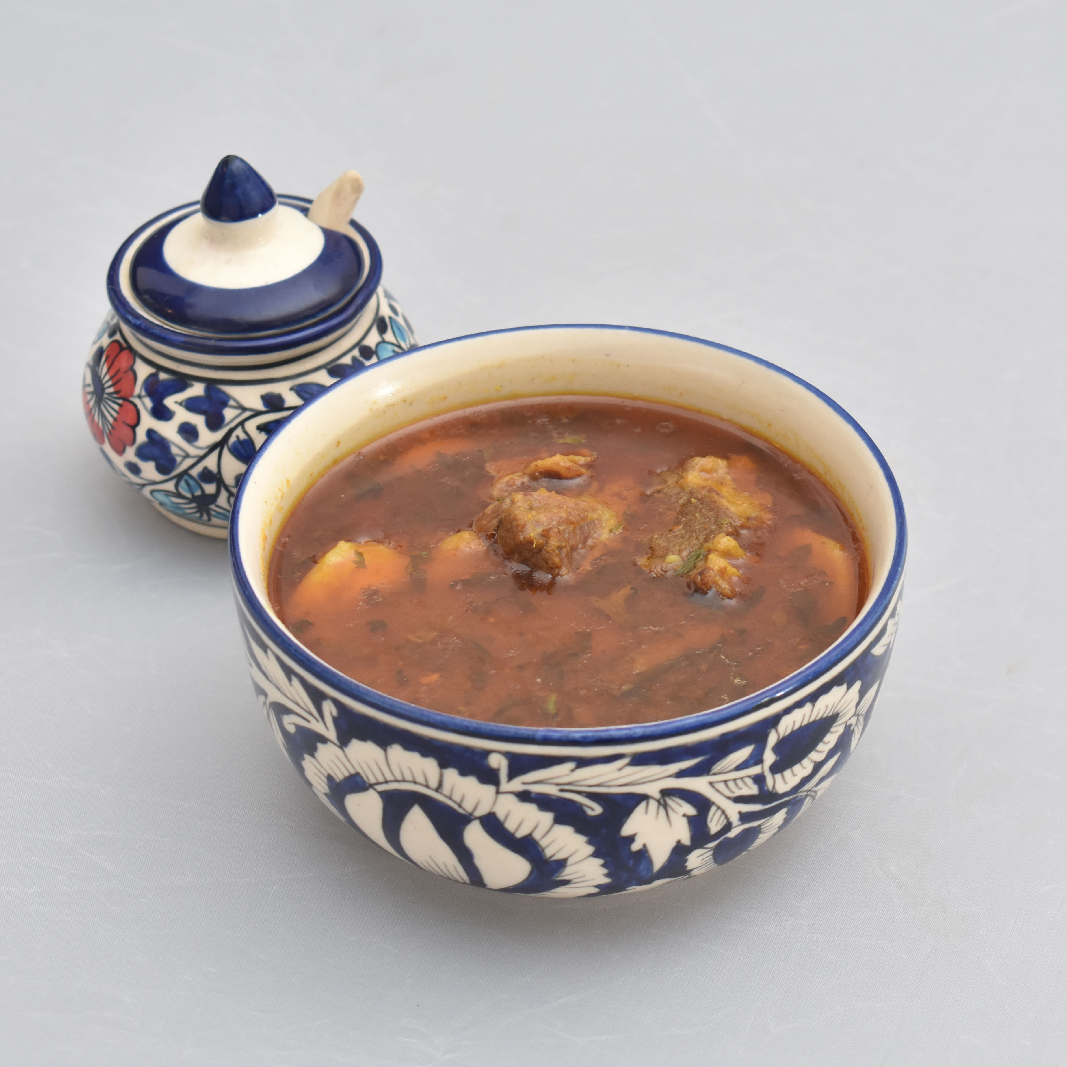 Naimat Khana - Logo