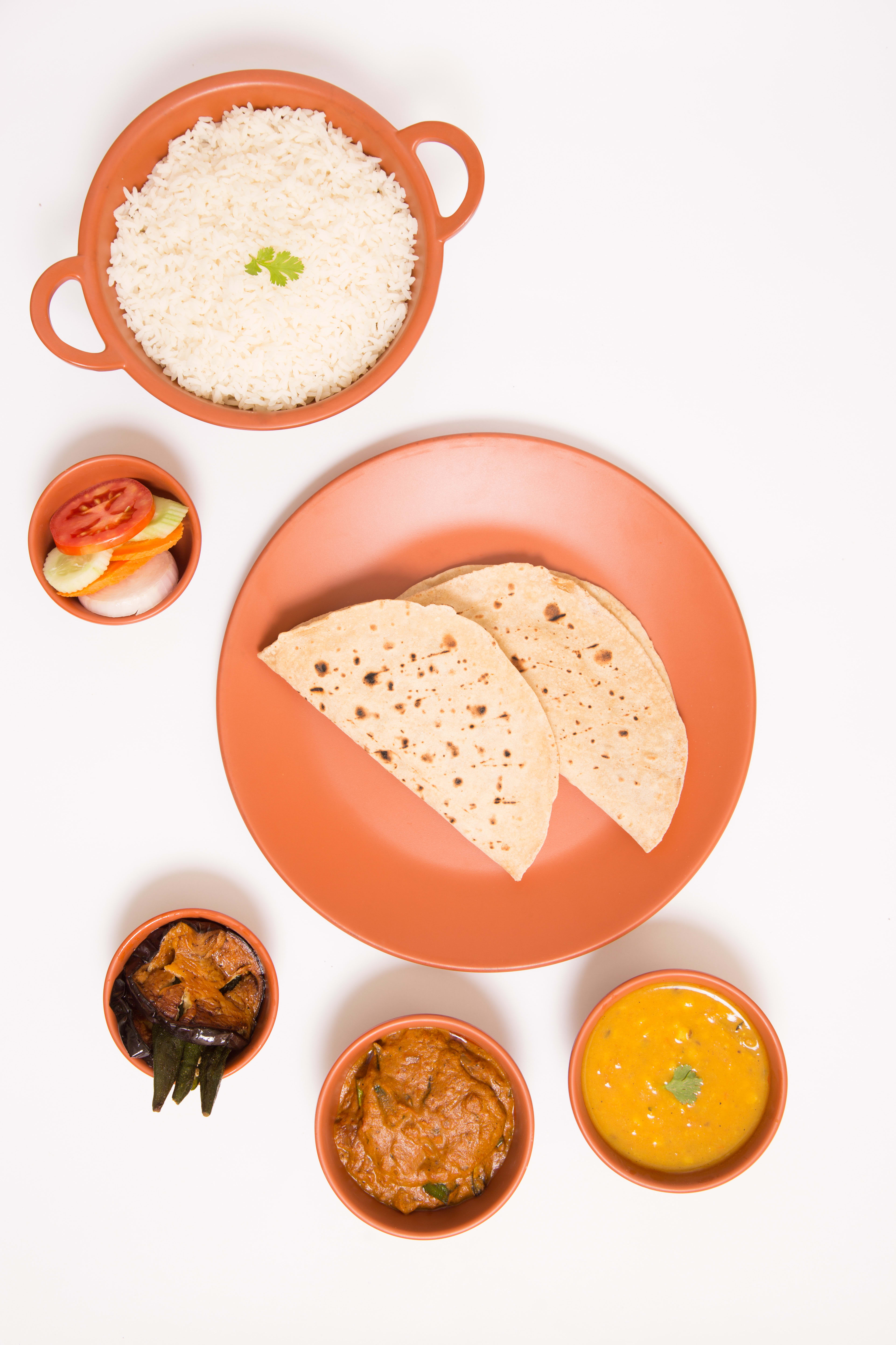 Naivedyam Hotel And Caterers - Logo