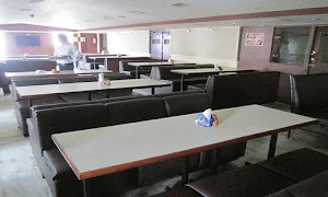 Nandhini Restaurant & Bar - Logo
