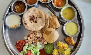 Natraj Dining Hall & Restaurant - Logo