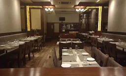 Navmi Family Restaurant And Bar - Logo