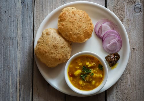 Navratna Udupi Pure Veg Restaurant - Logo