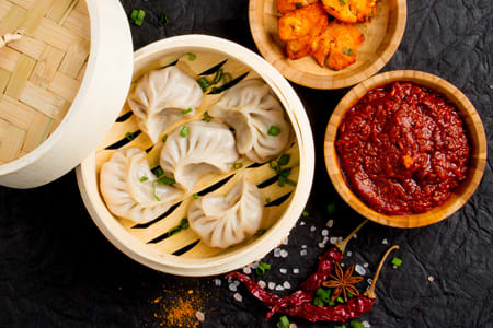 nayaab momos corner - Logo