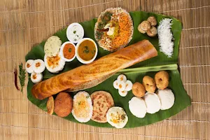 Nayam Kari Idli - Logo