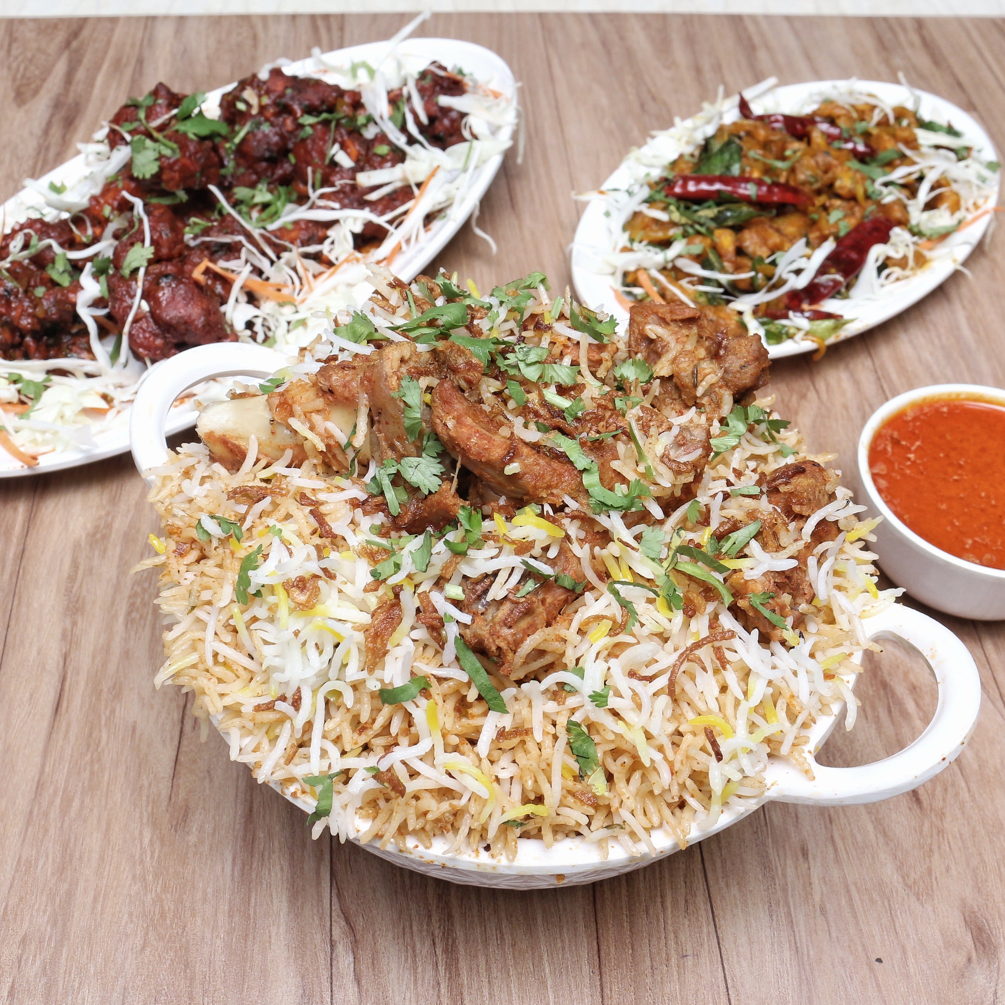New Amrutha Restaurant - Logo