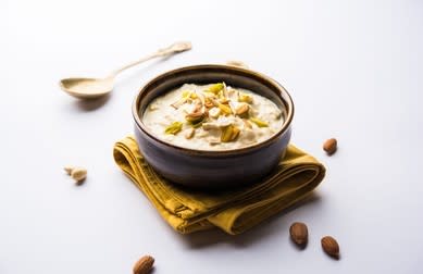New Babaji Gajak & Lassi Corner - Logo
