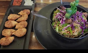 New Dahiya Momos And Chinese - Logo