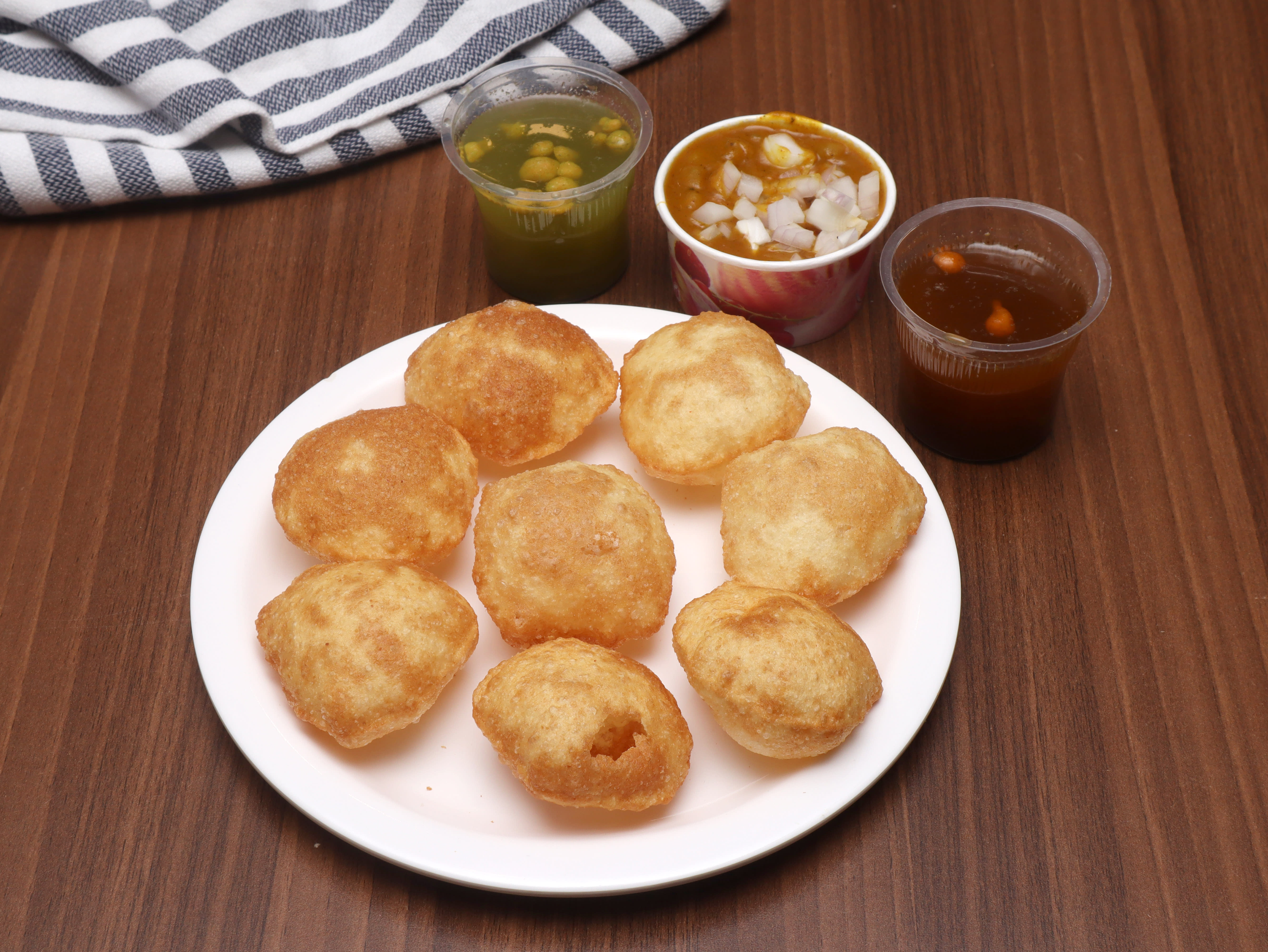 New Girdhari Chat Bhandar - Logo