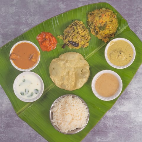 New Kairali Restaurant - Logo