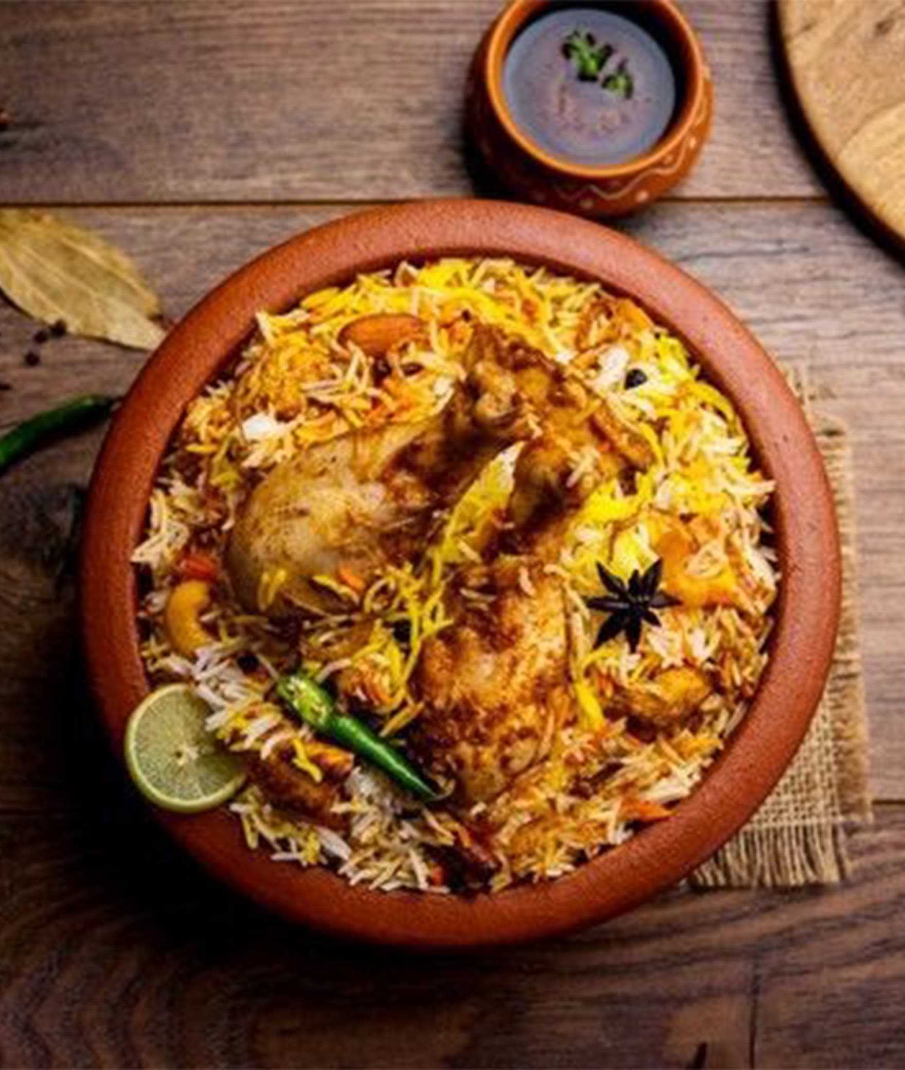 New Naaz Caterers Biryani House - Logo