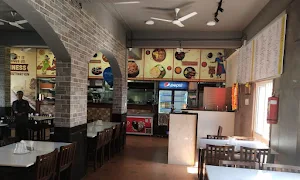 New Prashanth Hotel Express, Majestic - Logo