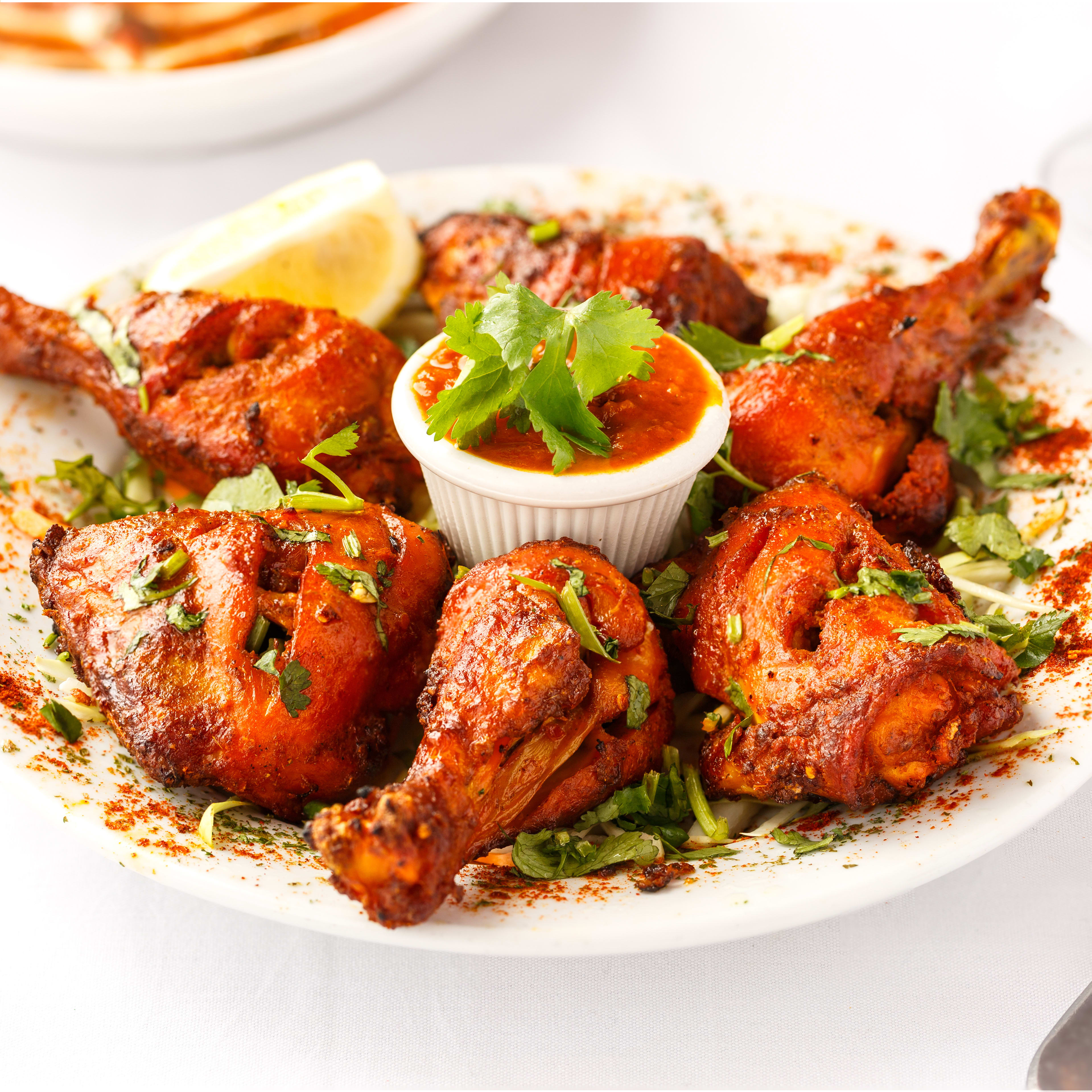 New Tushar Non Veg - Logo