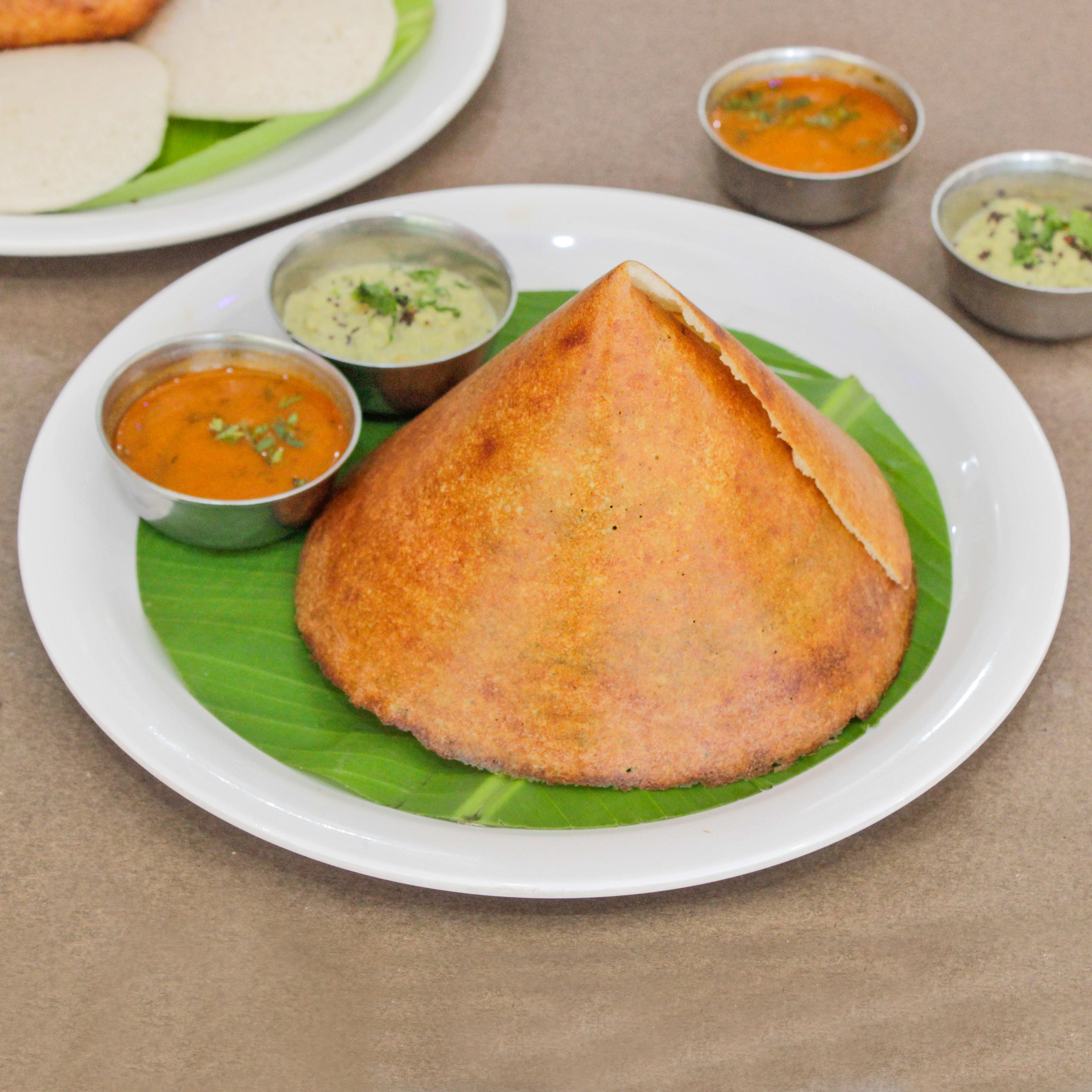 New Udupi Grand - Logo