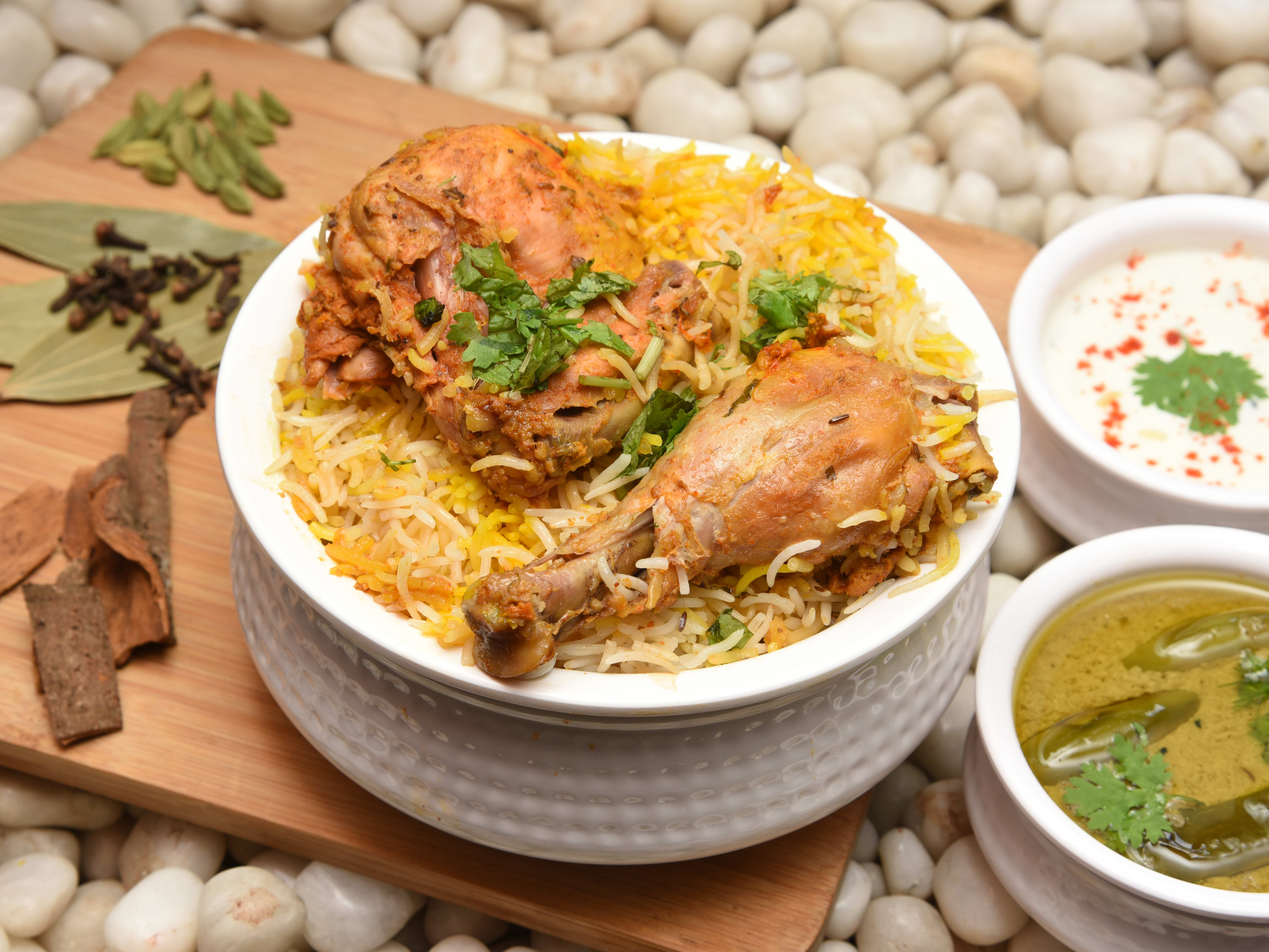 New zeeshan biryani house - Logo