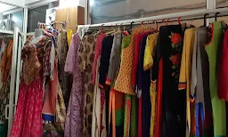 Nidhee Creation & Fabric - Logo