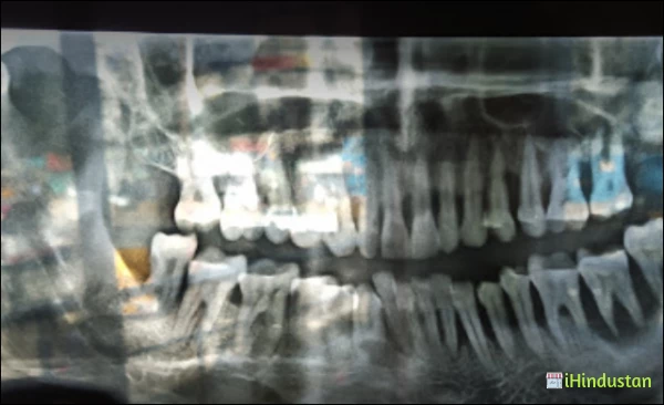 Nidhi Dental Clinic - Logo