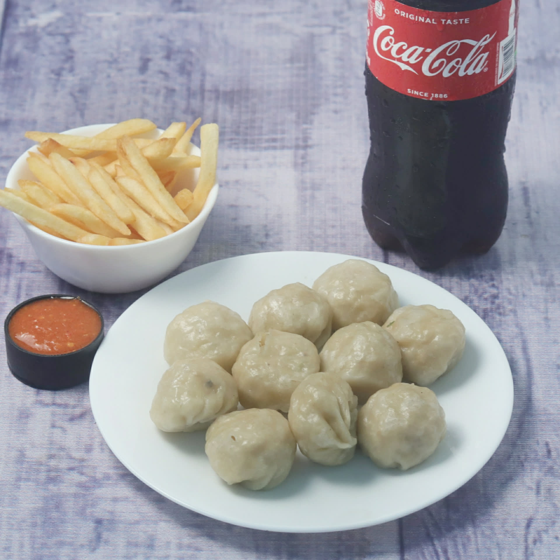 Nigar Momos - Logo