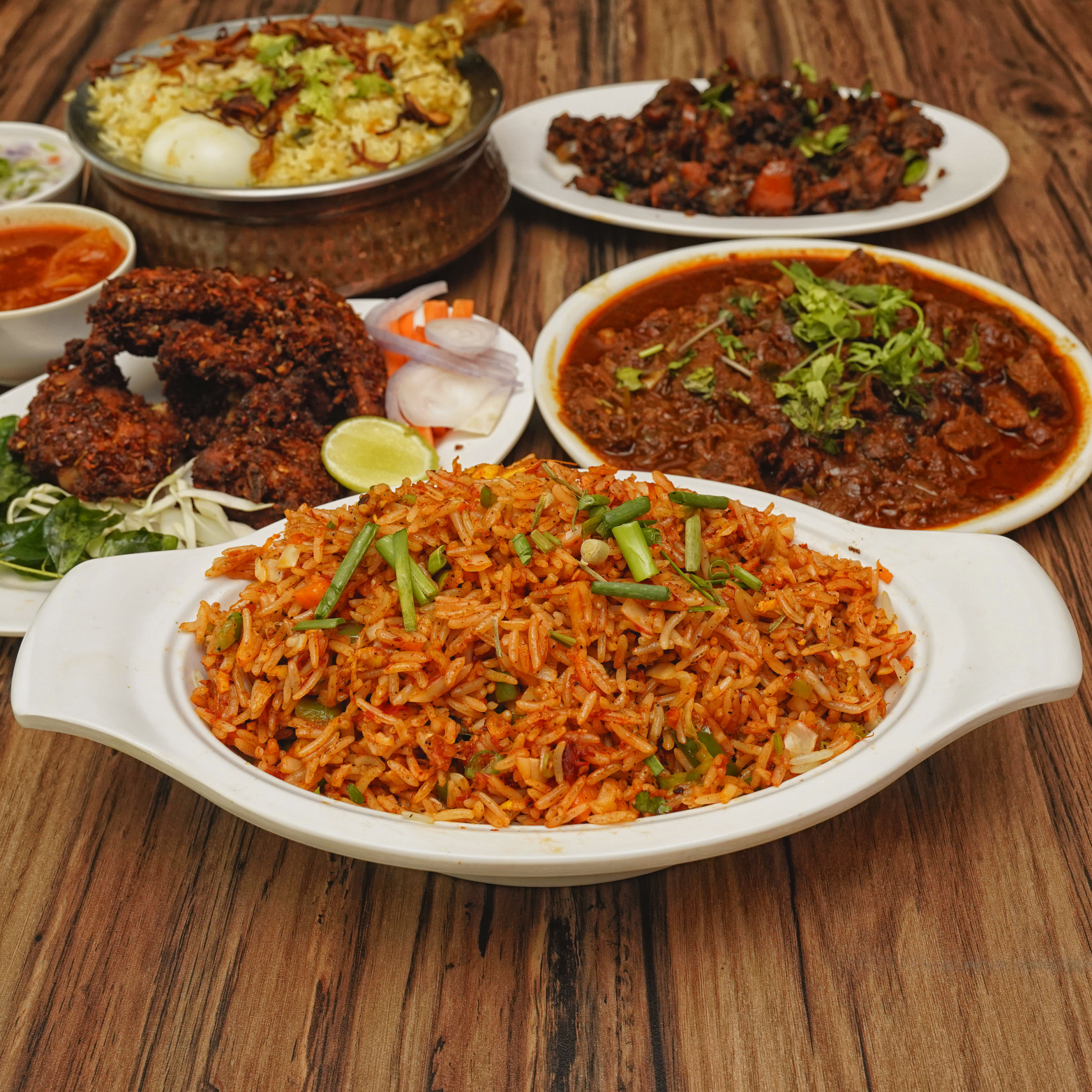 Nila Restaurant n cafe by Kozhikodan - Logo