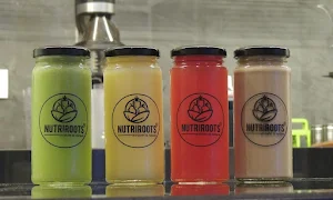Nutriroots Juice Centre - Logo