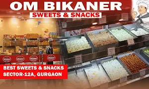 Om Bikaner Sweets & Restaurant - Logo