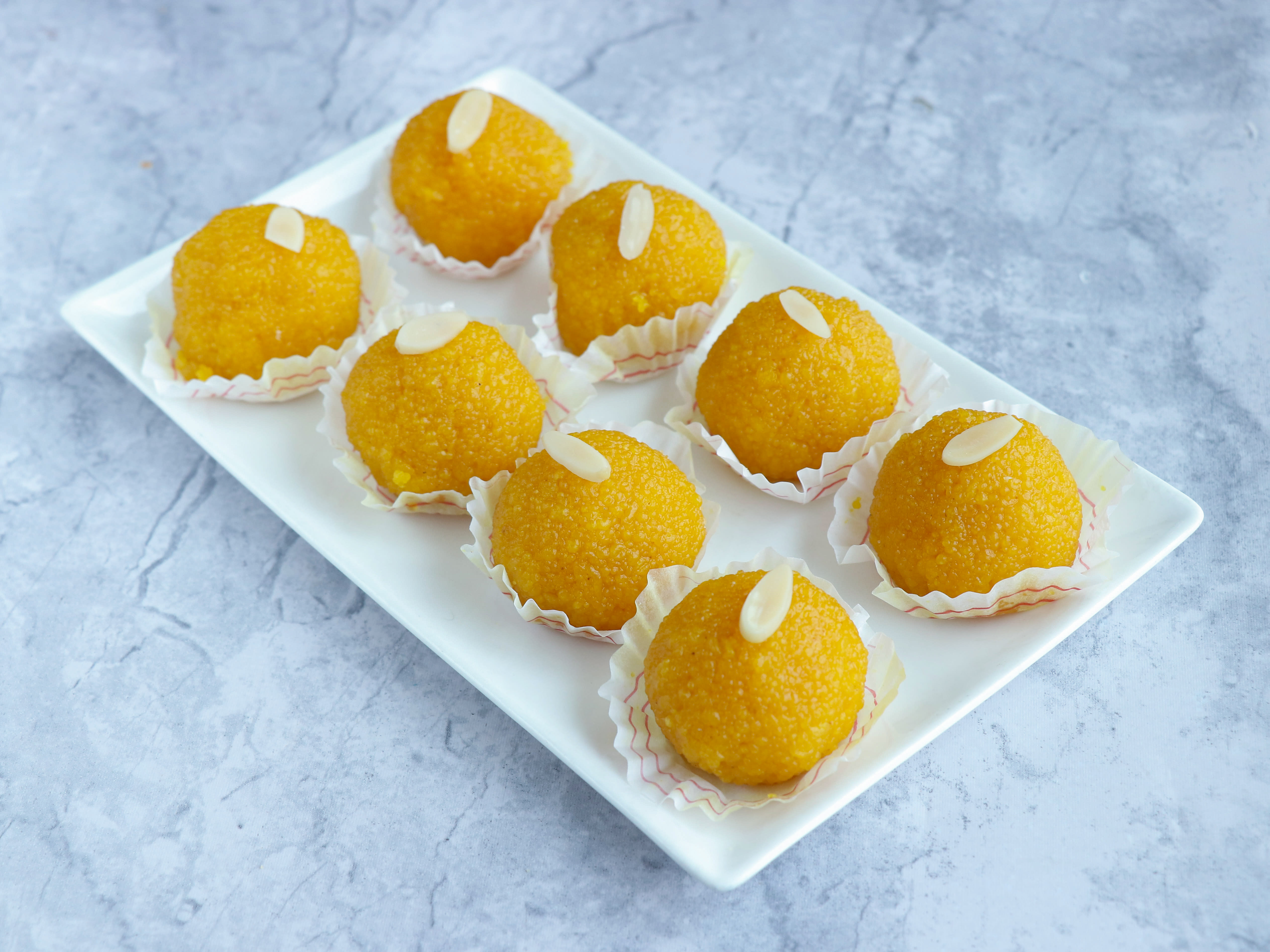 Om Sweets & Namkeens - Logo