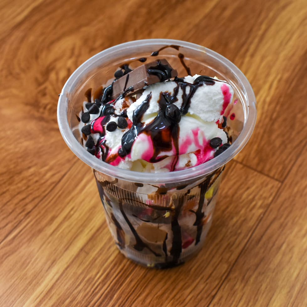 Om Top Ice Cream - Logo