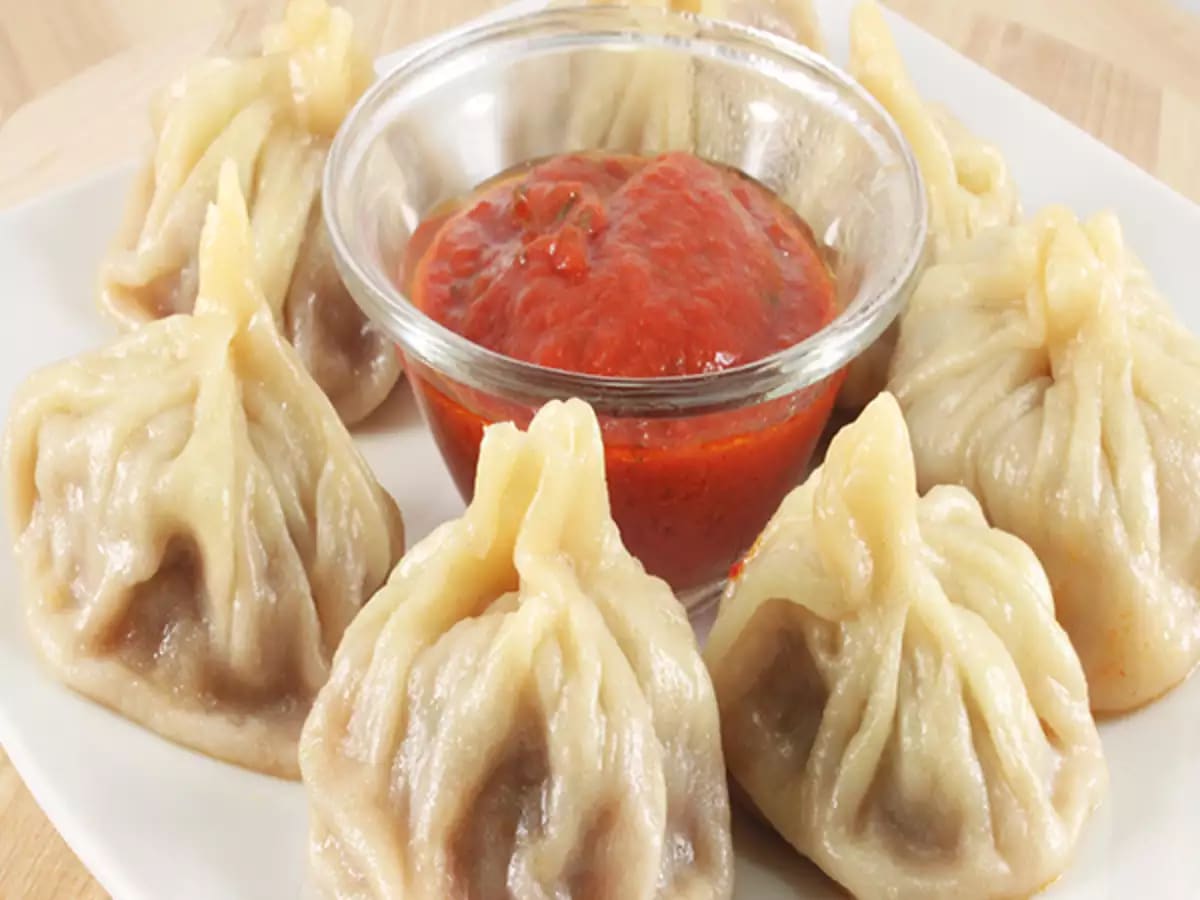 ONLY SPICY MOMOS - Logo