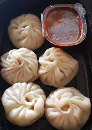 Orientel Momos - Logo